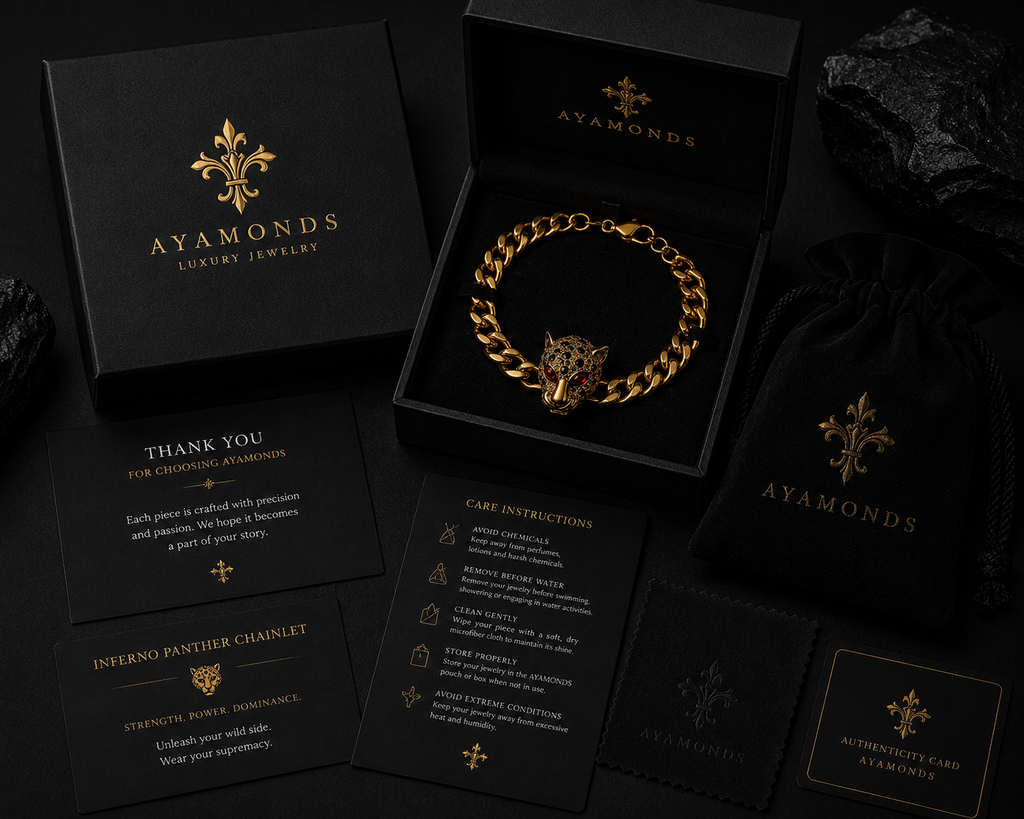 Gold chain bracelet in an Ayamonds jewelry box with branded materials.